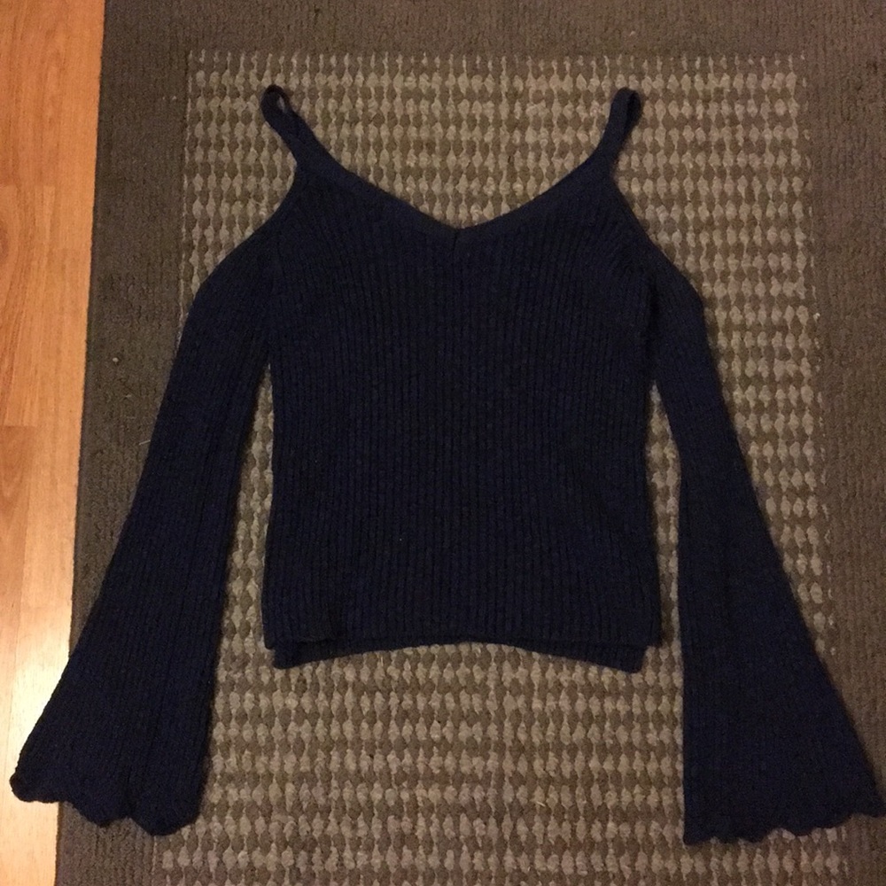 Long sleeve off the shoulder sweater.